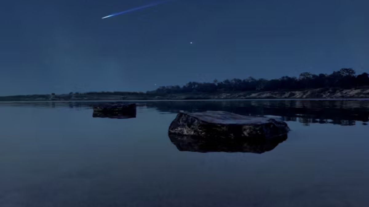 Chandratal Lake reflecting stars under a clear night sky