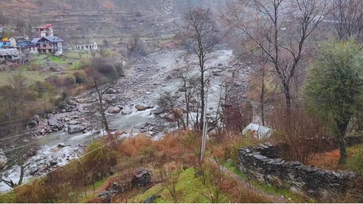 “River Parvati flowing near Kasol village during rainy season”