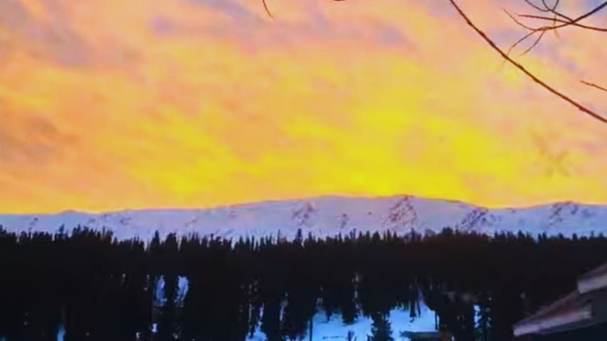 Solo traveler admiring sunset in the hills of Manali Himachal Pradesh