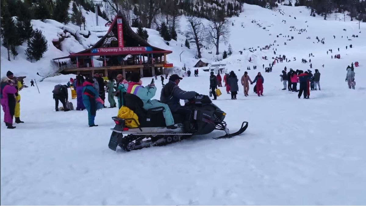 Tourists enjoying snow activities at Solang Valley near Manali
