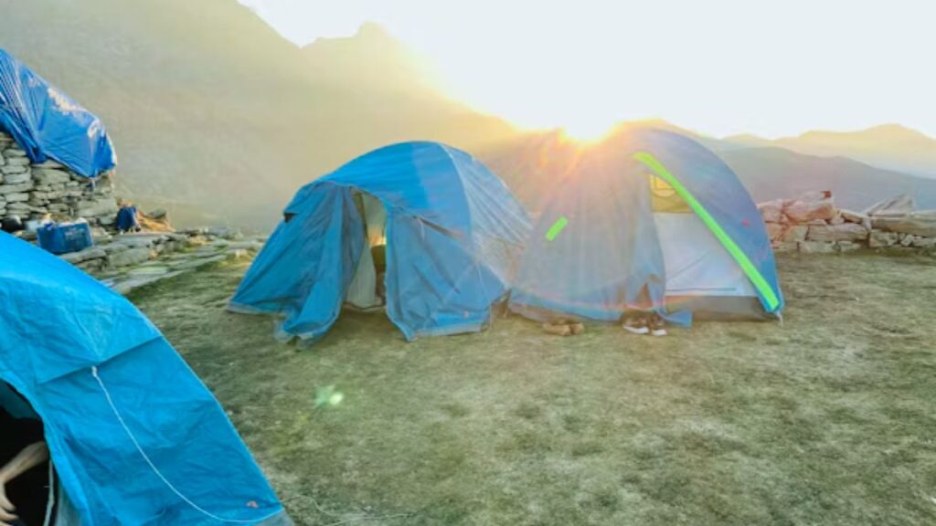 Camping tent in Himachal Pradesh mountains at sunrise (2025)