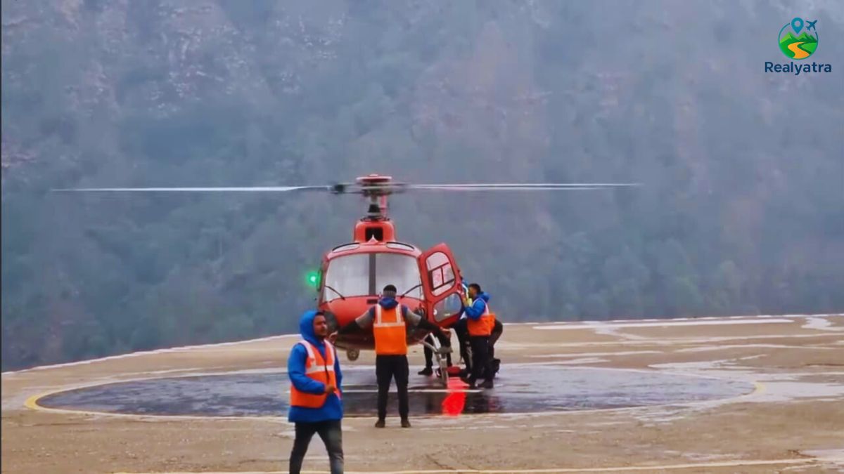 Pilgrims waiting at Kedarnath helipad in foggy weather