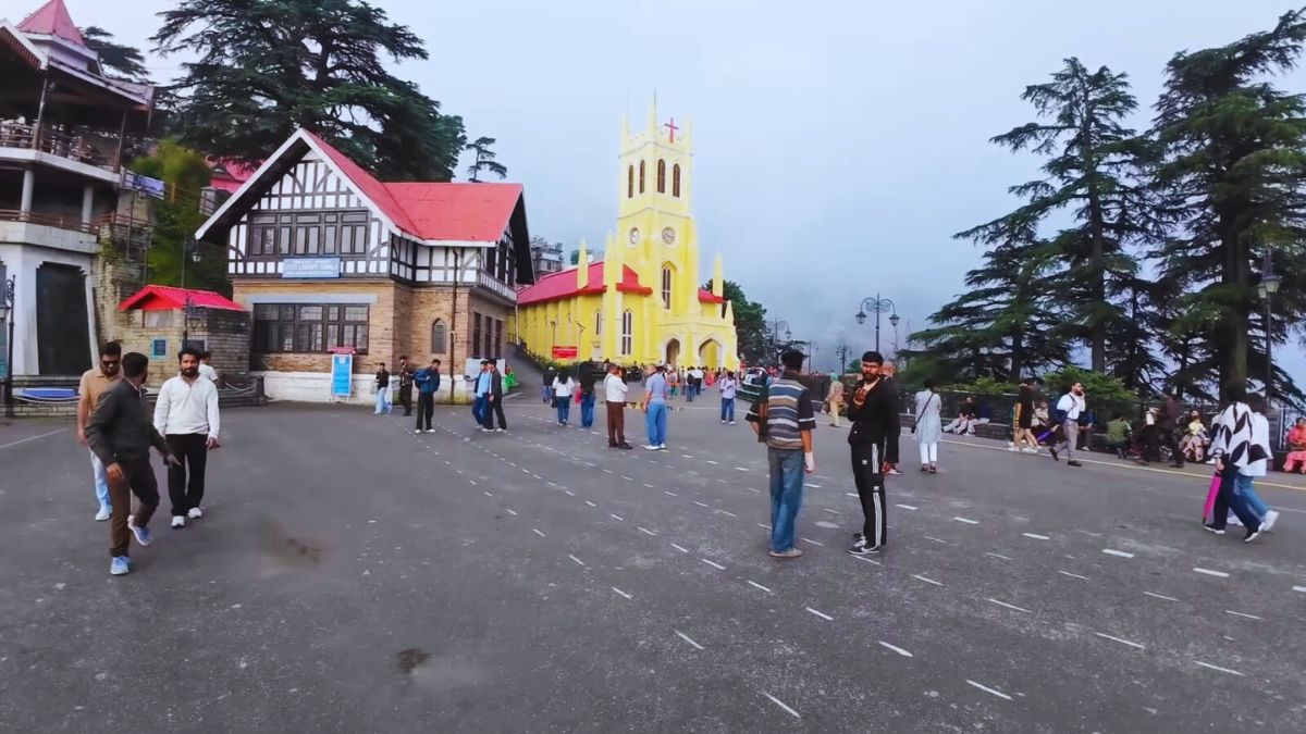 "Is Himachal Safe to Visit in July 2025" Shimla Mall Road in July 2025 with tourists enjoying clear weather