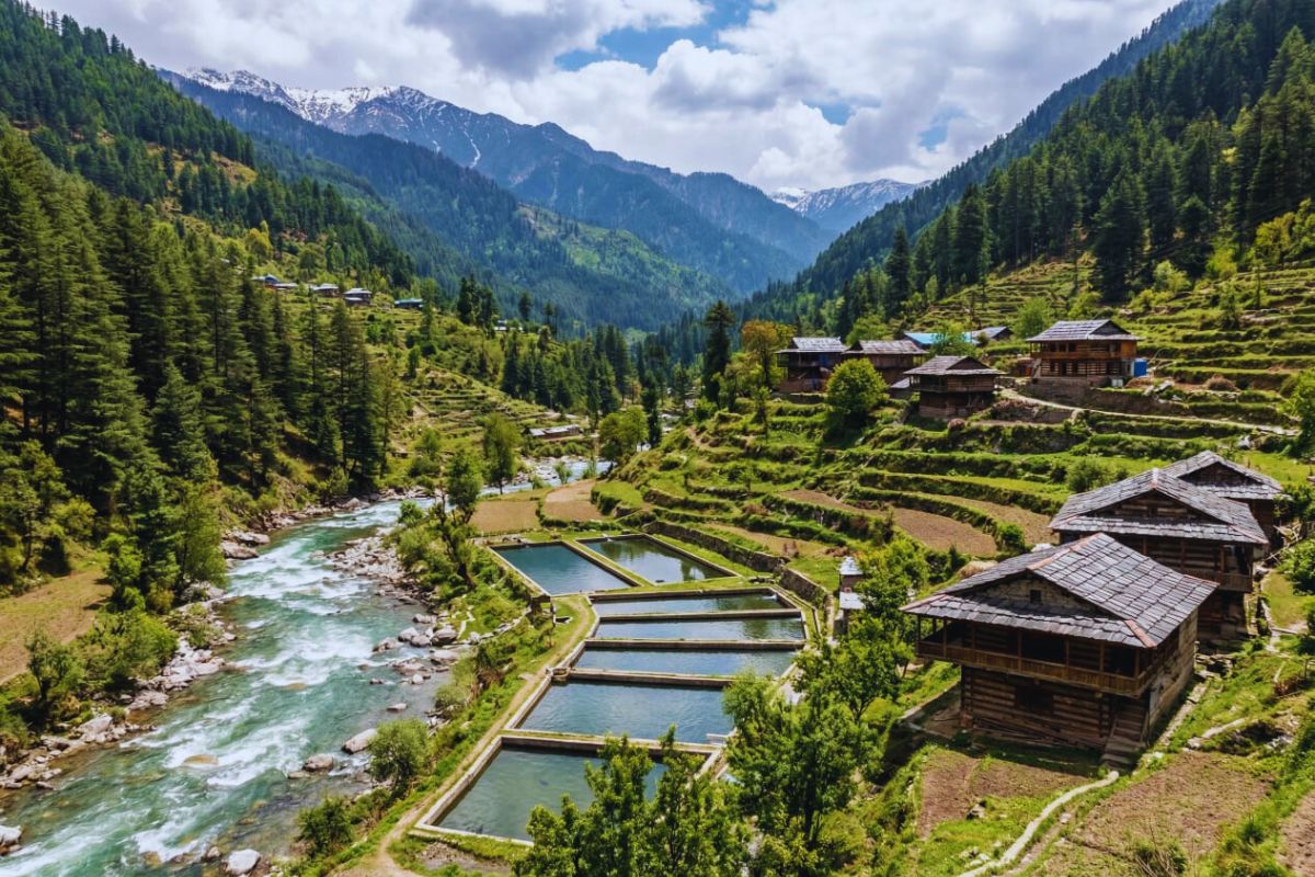 Uhl river and wooden homes in Barot Valley, Mandi district.
